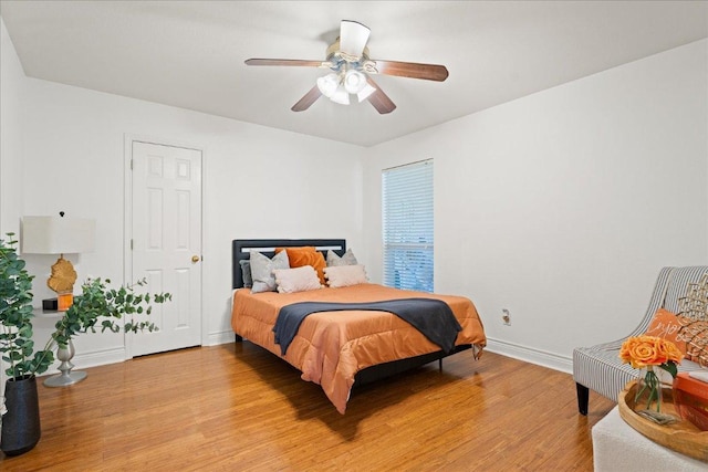 125 Fairway Ct, Bastrop, TX 78602 - bedroom featuring light wood finished floors and a ceiling fan