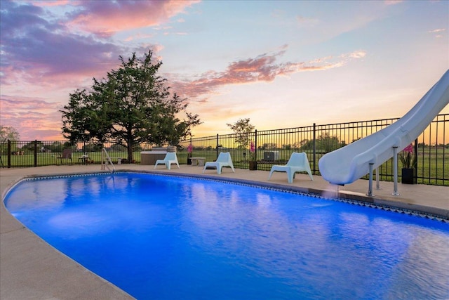 125 Fairway Ct, Bastrop, TX 78602 - view of pool featuring a water slide and a patio area