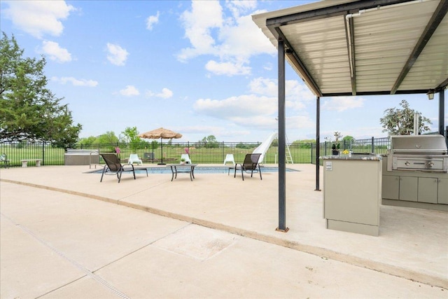 125 Fairway Ct, Bastrop, TX 78602 - view of home's community with area for grilling, a pool, and a patio