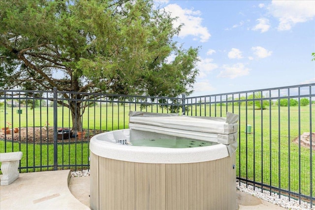 125 Fairway Ct, Bastrop, TX 78602 - view of patio / terrace with a hot tub