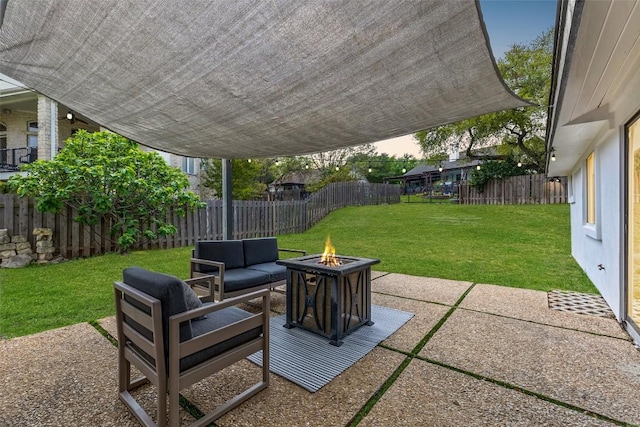 611 Ladin Ln, Lakeway, TX 78734 - fenced backyard featuring an outdoor fire pit and a patio area