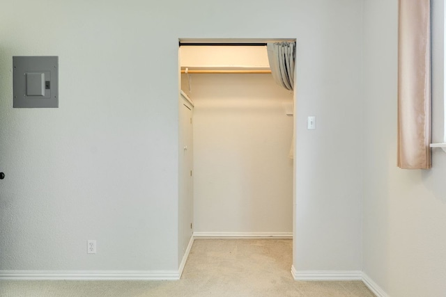 7409 Shadow Hill Dr Unit 105, Austin, TX 78731 - unfurnished bedroom with electric panel, a spacious closet, carpet, baseboards, and a closet
