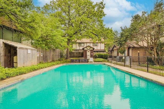 7409 Shadow Hill Dr Unit 105, Austin, TX 78731 - view of pool featuring cooling unit
