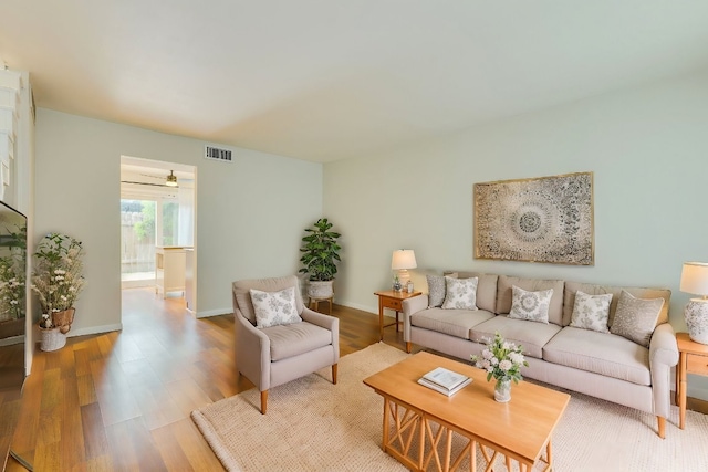 7409 Shadow Hill Dr Unit 105, Austin, TX 78731 - living room with wood finished floors and baseboards