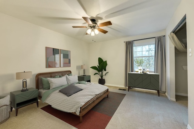 7409 Shadow Hill Dr Unit 105, Austin, TX 78731 - bedroom with carpet flooring, baseboards, and a ceiling fan
