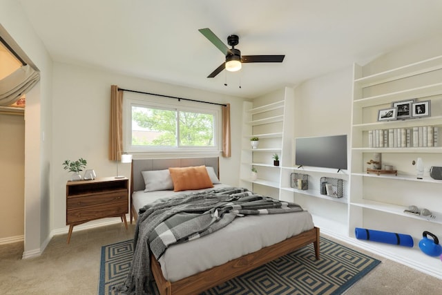 7409 Shadow Hill Dr Unit 105, Austin, TX 78731 - carpeted bedroom with baseboards and a ceiling fan