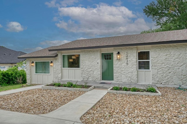 12635 Live Oak Ln, Buda, TX 78610 - view of front of house featuring stone siding, board and batten siding, and a shingled roof