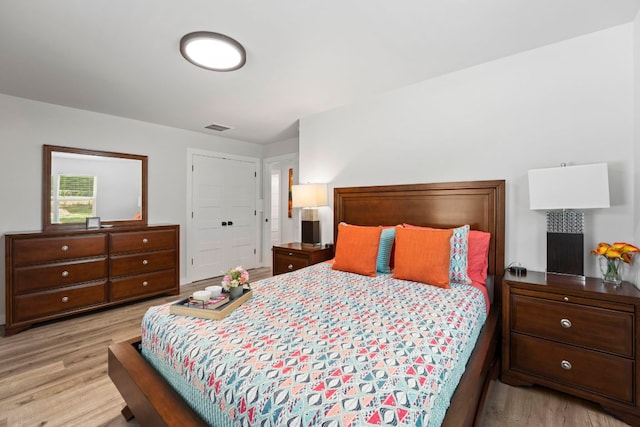 12635 Live Oak Ln, Buda, TX 78610 - bedroom featuring light wood-style flooring