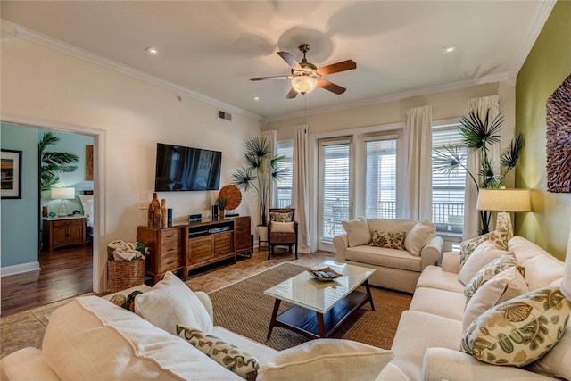 1001 The Cape Rd Unit 32, Horseshoe Bay, TX 78657 - living area with a ceiling fan, crown molding, wood finished floors, and recessed lighting