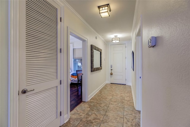 1001 The Cape Rd Unit 32, Horseshoe Bay, TX 78657 - hall with crown molding and light tile patterned floors