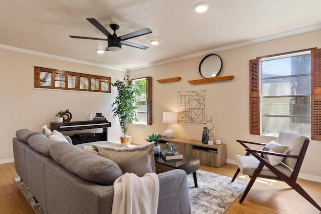1201 Larkwood Dr, Austin, TX 78723 - living area with crown molding, light wood-style floors, a ceiling fan, baseboards, and recessed lighting