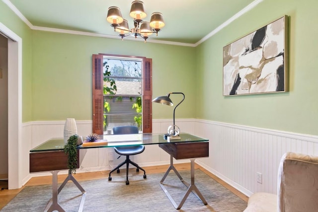 1201 Larkwood Dr, Austin, TX 78723 - home office with wood finished floors, a wainscoted wall, a chandelier, and ornamental molding