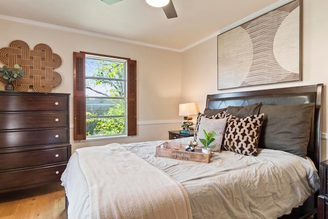 1201 Larkwood Dr, Austin, TX 78723 - bedroom featuring crown molding, wood finished floors, and ceiling fan