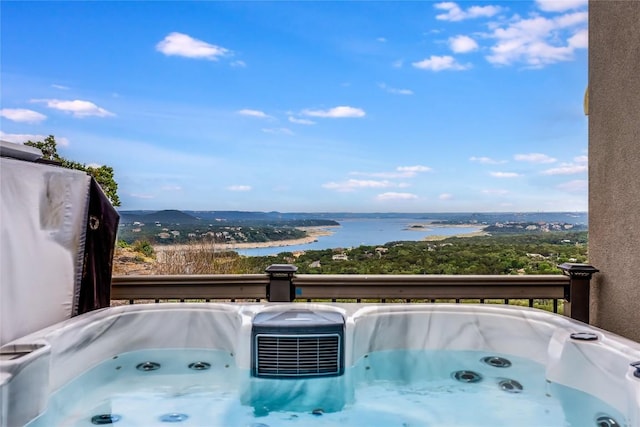 8612 Tip Top Dr Unit 2, Jonestown, TX 78645 - patio / terrace with a hot tub and a water view