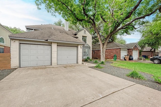 12203 Arrowwood Dr, Austin, TX 78727 - traditional-style house featuring brick siding, concrete driveway, a shingled roof, a chimney, and a garage