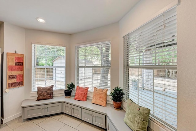 12203 Arrowwood Dr, Austin, TX 78727 - living area featuring plenty of natural light, light tile patterned flooring, and recessed lighting