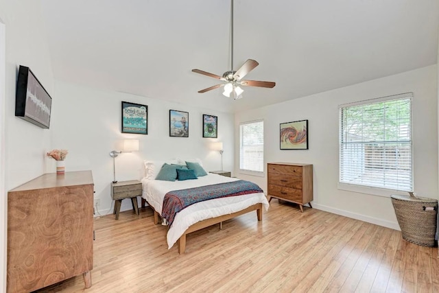 12203 Arrowwood Dr, Austin, TX 78727 - bedroom with light wood-type flooring and a ceiling fan