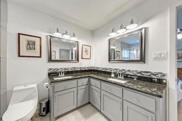 12203 Arrowwood Dr, Austin, TX 78727 - full bath featuring double vanity and tile patterned floors