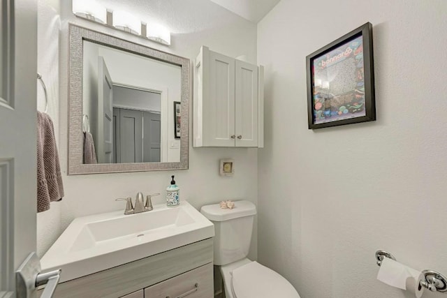 12203 Arrowwood Dr, Austin, TX 78727 - bathroom with toilet and vanity