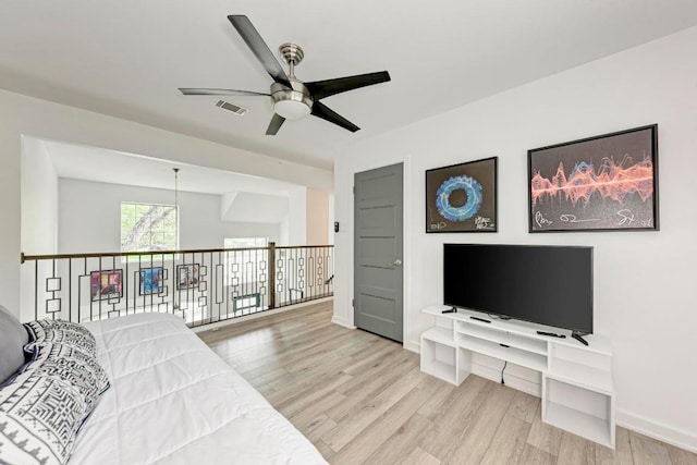 12203 Arrowwood Dr, Austin, TX 78727 - living room with a ceiling fan and wood finished floors