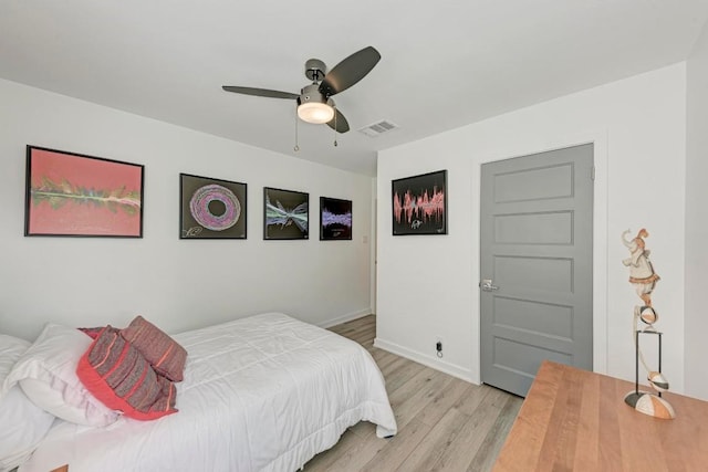 12203 Arrowwood Dr, Austin, TX 78727 - bedroom with light wood-type flooring and ceiling fan