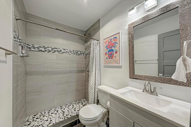 12203 Arrowwood Dr, Austin, TX 78727 - bathroom featuring tiled shower and vanity
