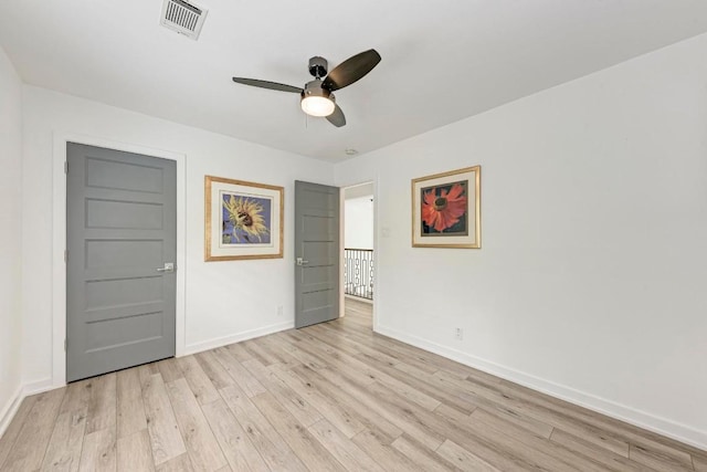 12203 Arrowwood Dr, Austin, TX 78727 - unfurnished bedroom with light wood-type flooring and a ceiling fan