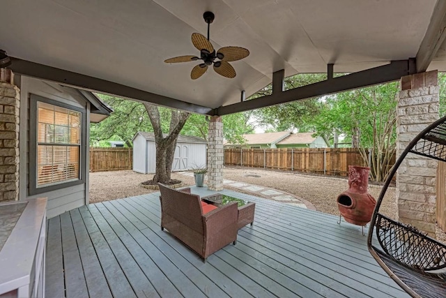 12203 Arrowwood Dr, Austin, TX 78727 - wooden terrace with a storage shed, a fenced backyard, and a ceiling fan