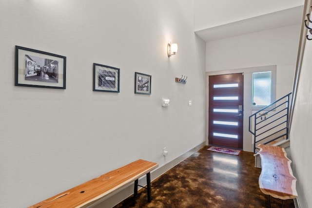 1907 E 20th St, Austin, TX 78722 - foyer featuring finished concrete floors and stairway