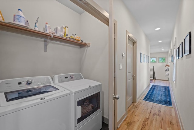 1907 E 20th St, Austin, TX 78722 - laundry room with independent washer and dryer, light wood-style floors, and recessed lighting