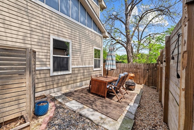 1907 E 20th St, Austin, TX 78722 - fenced backyard featuring a patio area and outdoor dining area