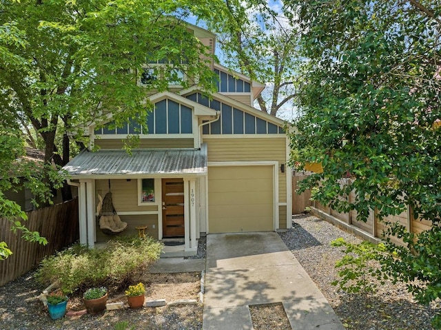 1907 E 20th St, Austin, TX 78722 - mid-century modern home with concrete driveway, a garage, a metal roof, a porch, and board and batten siding