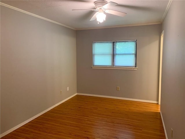 2304 Lasso Dr, Round Rock, TX 78681 - unfurnished room with wood finished floors, ornamental molding, and ceiling fan
