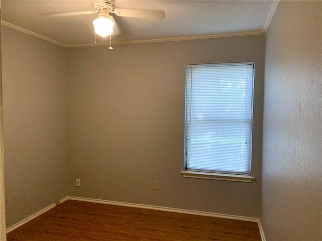 2304 Lasso Dr, Round Rock, TX 78681 - spare room featuring wood finished floors, healthy amount of natural light, a ceiling fan, and crown molding