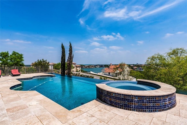 1300 Apache Tears, Horseshoe Bay, TX 78657 - view of swimming pool with a patio and a pool with connected hot tub