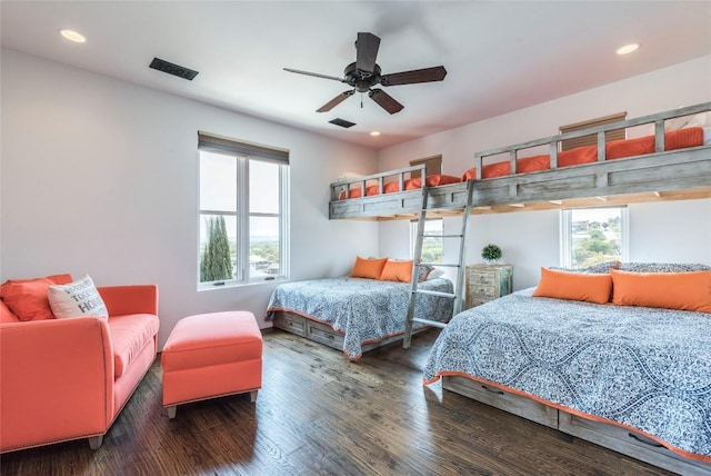 1300 Apache Tears, Horseshoe Bay, TX 78657 - bedroom featuring multiple windows, recessed lighting, wood finished floors, and ceiling fan