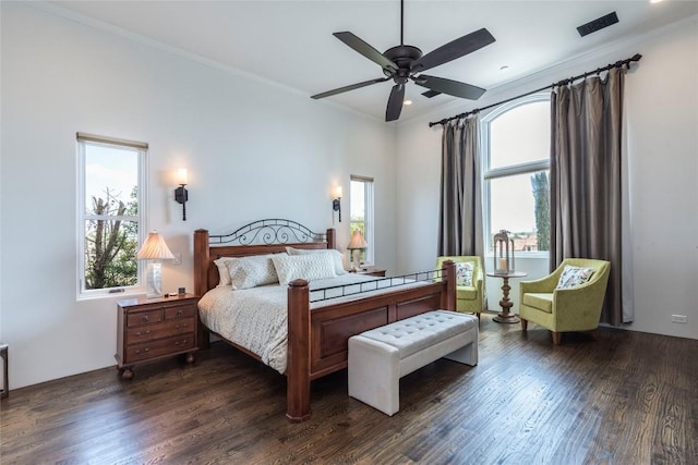 1300 Apache Tears, Horseshoe Bay, TX 78657 - bedroom with dark wood-type flooring, ornamental molding, and recessed lighting
