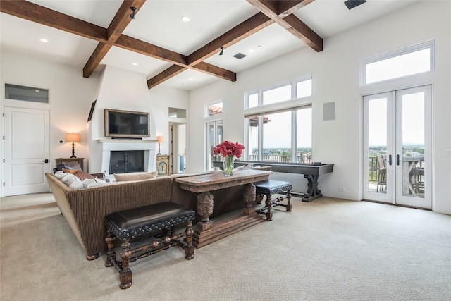 1300 Apache Tears, Horseshoe Bay, TX 78657 - living room with french doors, carpet floors, beam ceiling, plenty of natural light, and coffered ceiling