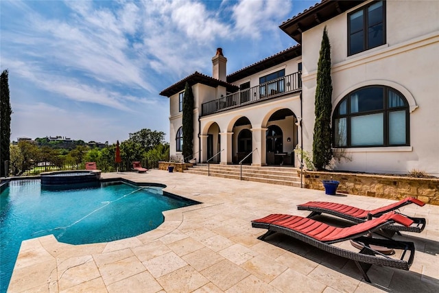 1300 Apache Tears, Horseshoe Bay, TX 78657 - view of pool featuring a patio and a pool with connected hot tub