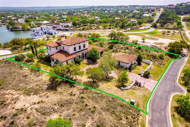 1300 Apache Tears, Horseshoe Bay, TX 78657 - view from above of property with property boundaries highlighted and a nearby body of water