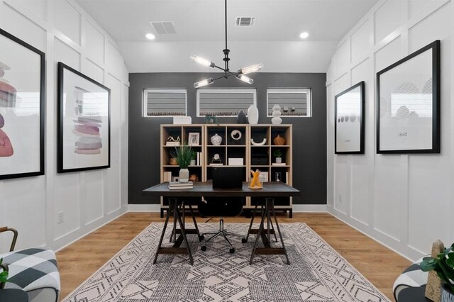 20502 Ed Townes Ter, Manor, TX 78653 - office area featuring a chandelier, light wood finished floors, and lofted ceiling