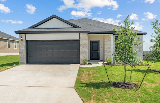 918 Childress Dr, Temple, TX 76501 - ranch-style home featuring brick siding, concrete driveway, an attached garage, and a front yard