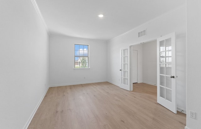 918 Childress Dr, Temple, TX 76501 - empty room featuring french doors, crown molding, light wood-type flooring, and recessed lighting