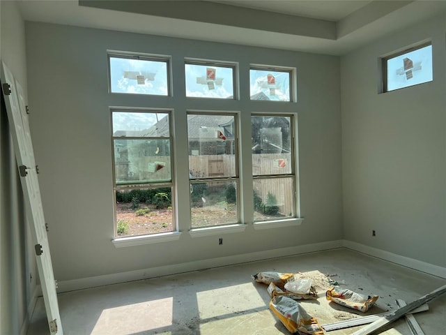 empty room featuring baseboards