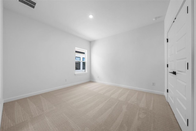 5513 Olimpico Way, Leander, TX 78641 - unfurnished room with light colored carpet, a smoke detector, and recessed lighting