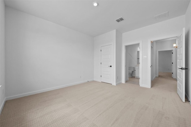 5513 Olimpico Way, Leander, TX 78641 - unfurnished bedroom featuring light colored carpet and connected bathroom