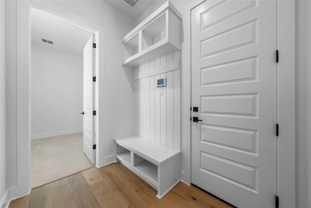 5513 Olimpico Way, Leander, TX 78641 - mudroom with light wood-type flooring and baseboards