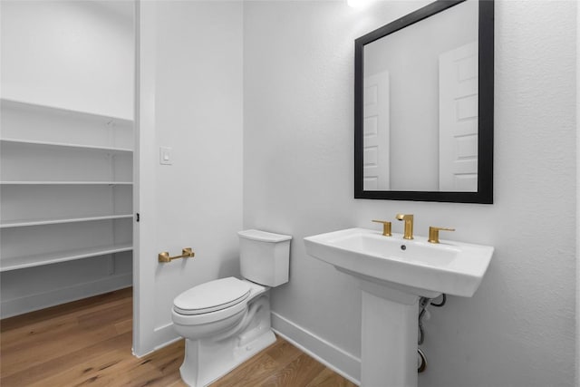 5513 Olimpico Way, Leander, TX 78641 - half bath with wood finished floors and baseboards