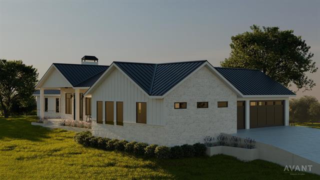 400 Shale, Horseshoe Bay, TX 78657 - exterior space with a standing seam roof, metal roof, and a garage