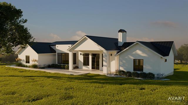 400 Shale, Horseshoe Bay, TX 78657 - back of house with metal roof and a standing seam roof